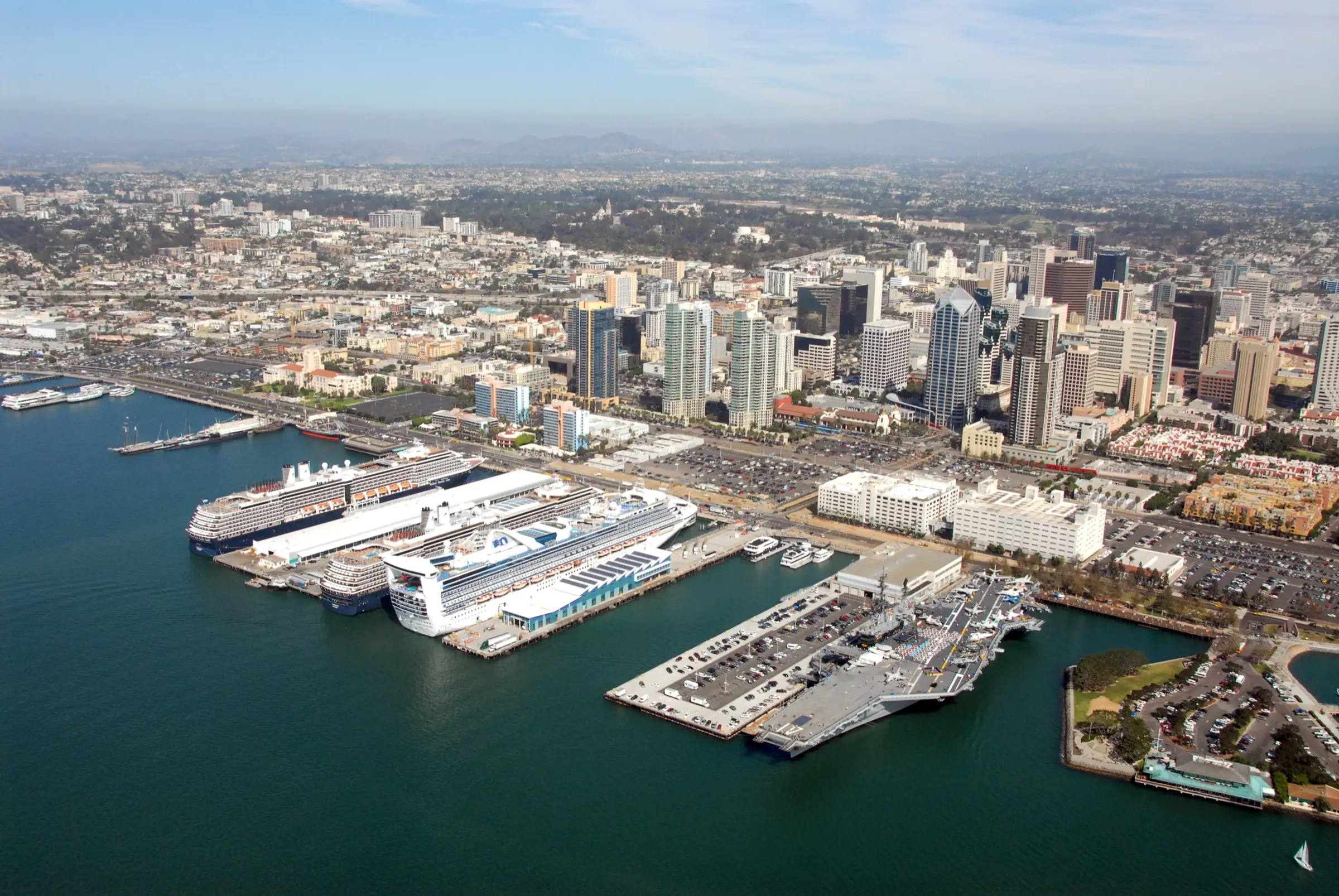 Aerial view of downtown San Diego's waterfront, with cruise ships alongside and the lots along North Harbor Drive, October 2012